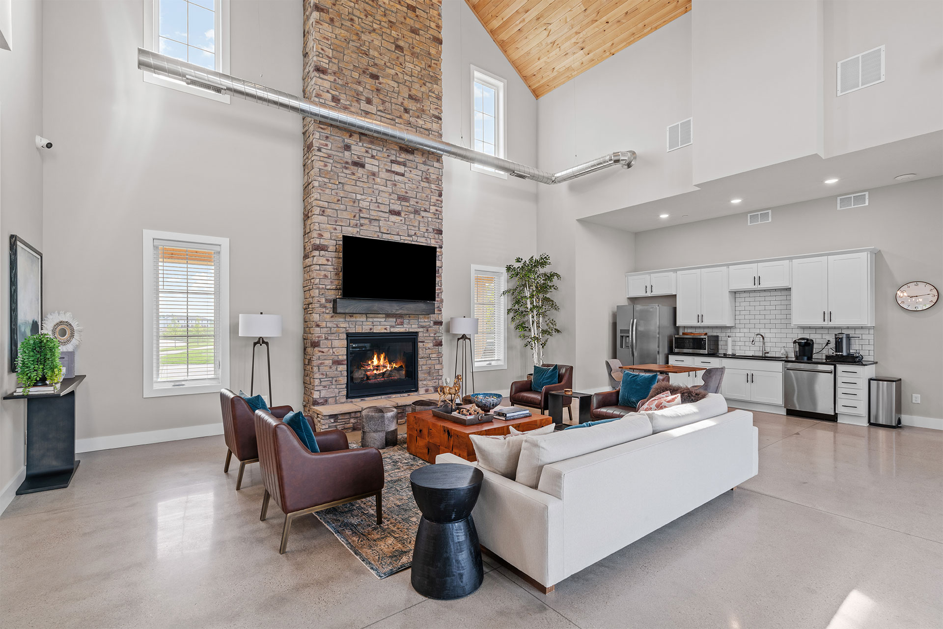 clubhouse with fireplace and comfortable seating