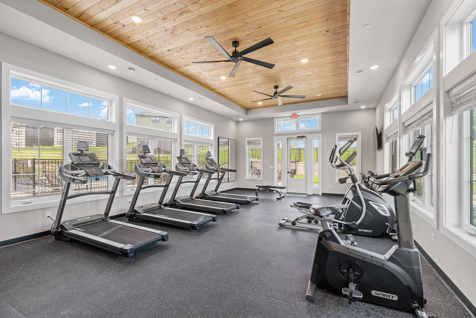 community fitness center with treadmills and other cardio equipment